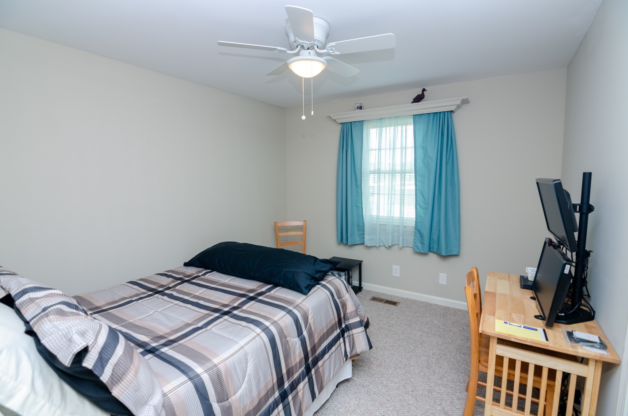 1128 General George Patton Road Nashville, TN 37221 - Photo 23 of 33 a bedroom with a bed and a window