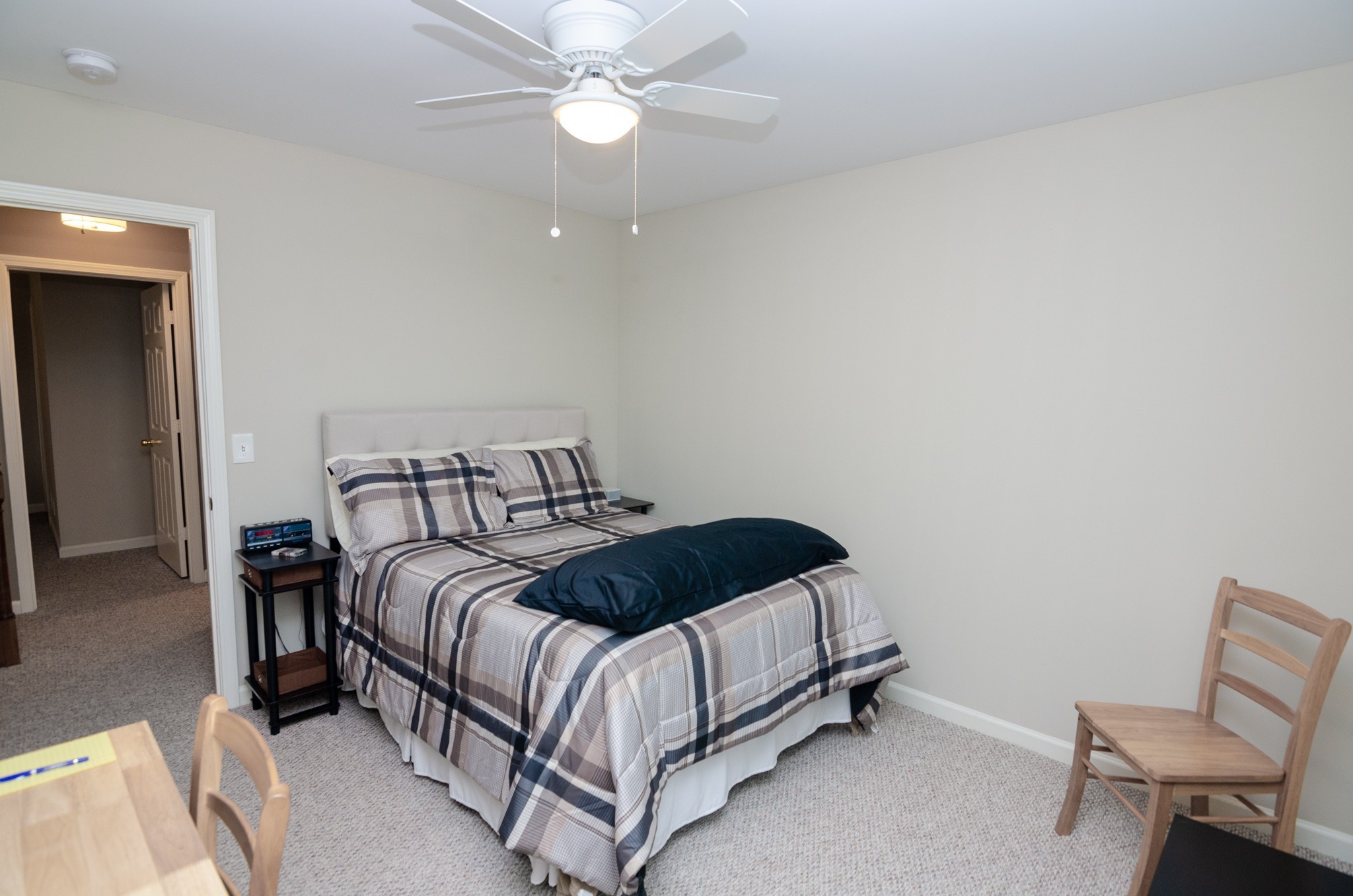 1128 General George Patton Road Nashville, TN 37221 - Photo 24 of 33 a bedroom with a bed and a chair