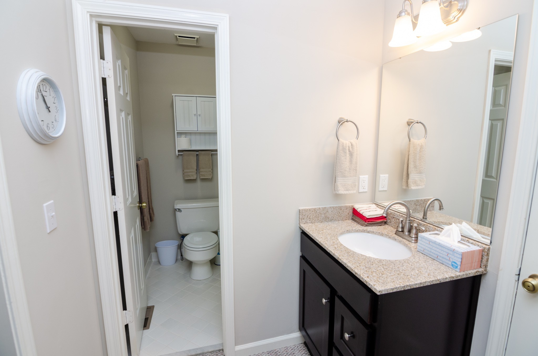 1128 General George Patton Road Nashville, TN 37221 - Photo 27 of 33 a bathroom with a sink vanity and a mirror