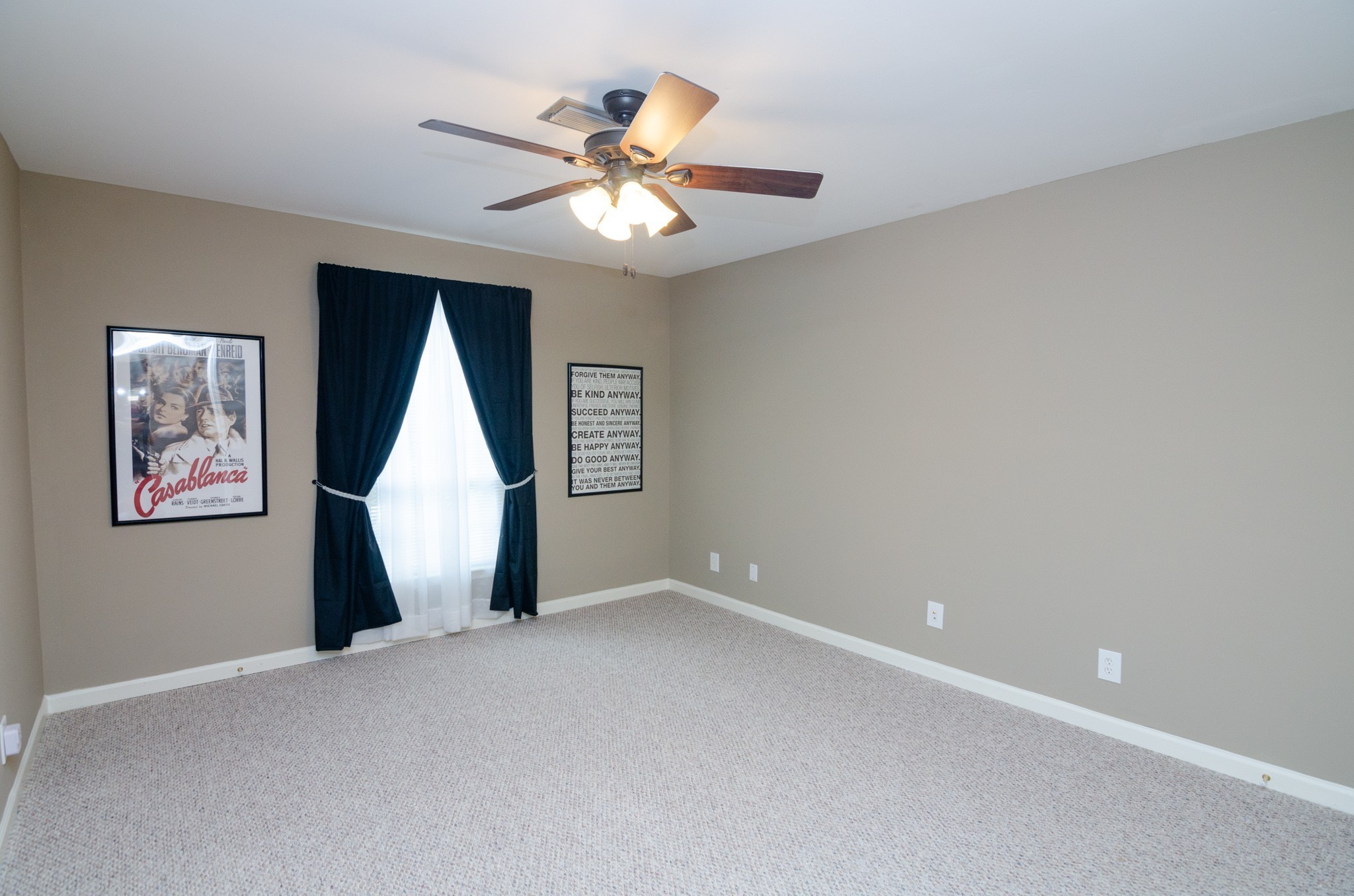 1128 General George Patton Road Nashville, TN 37221 - Photo 10 of 33 an empty room with closet and a chandelier fan