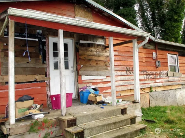 a view of the house with a patio