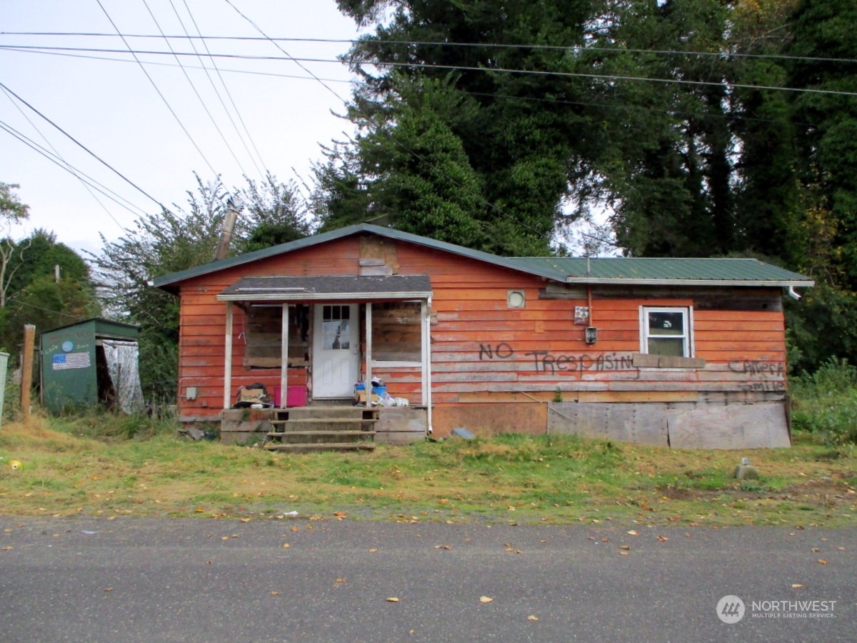 699 Copalis Beach Road Copalis Beach, WA 98535 - Photo 7 of 19 a view of a house with backyard