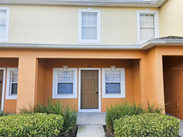 a front view of a house having yard