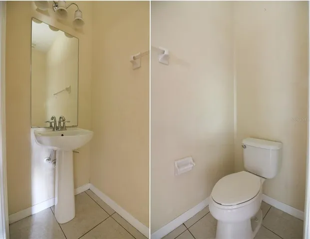 a white toilet sitting next to a bathroom sink