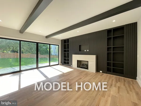 a view of water heater room with a fireplace