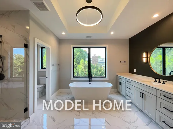 a view of storage and utility room with wooden floor