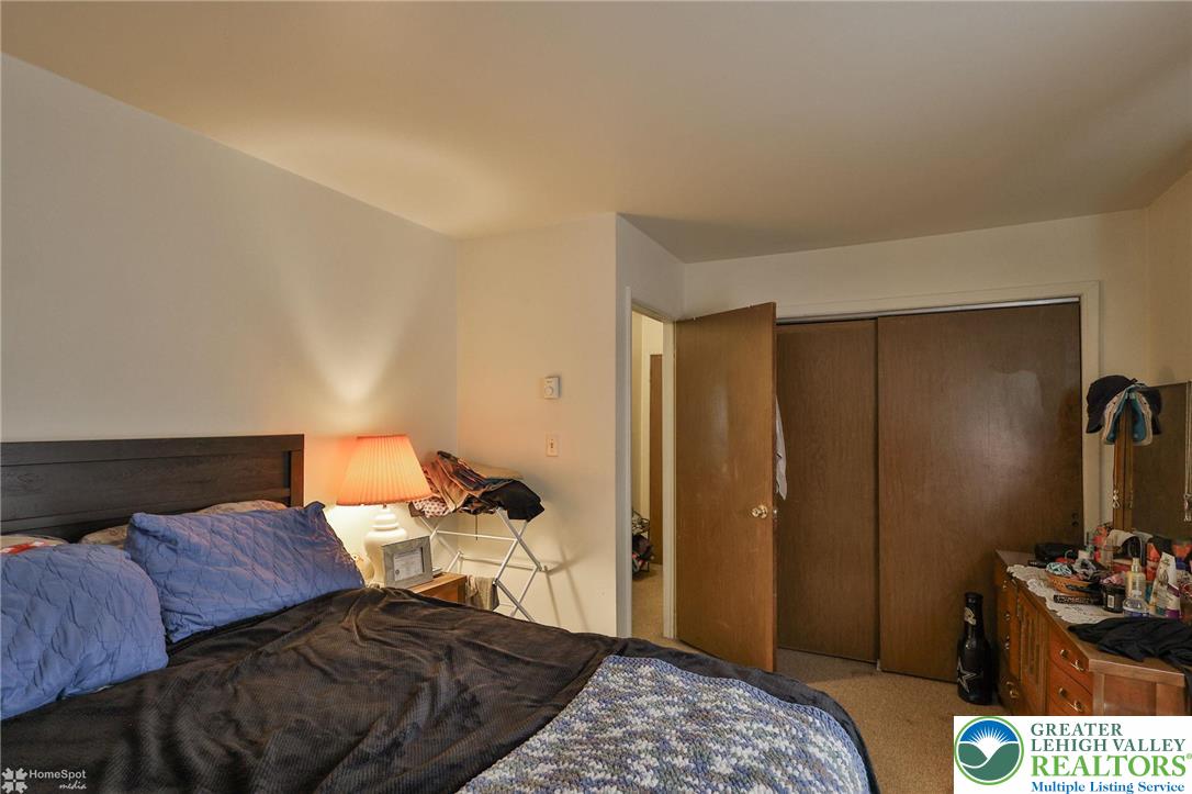 802 West Berwick Street Easton, PA 18042 - Photo 23 of 54 a bedroom with a bed and dresser