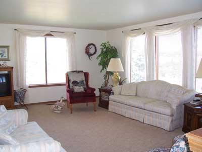 1502 Stein Road Yakima, WA 98908 - Photo 3 of 10 a living room with furniture and a window