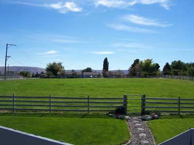 1502 Stein Road Yakima, WA 98908 - Photo 8 of 10 a view of a golf course with a garden
