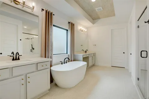 a view of an empty room with glass door