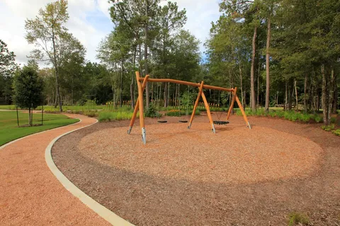 a view of a park with a slide
