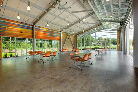 a view of swimming pool with sitting area