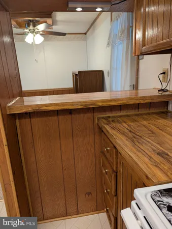 a bathroom with a sink a mirror and vanity