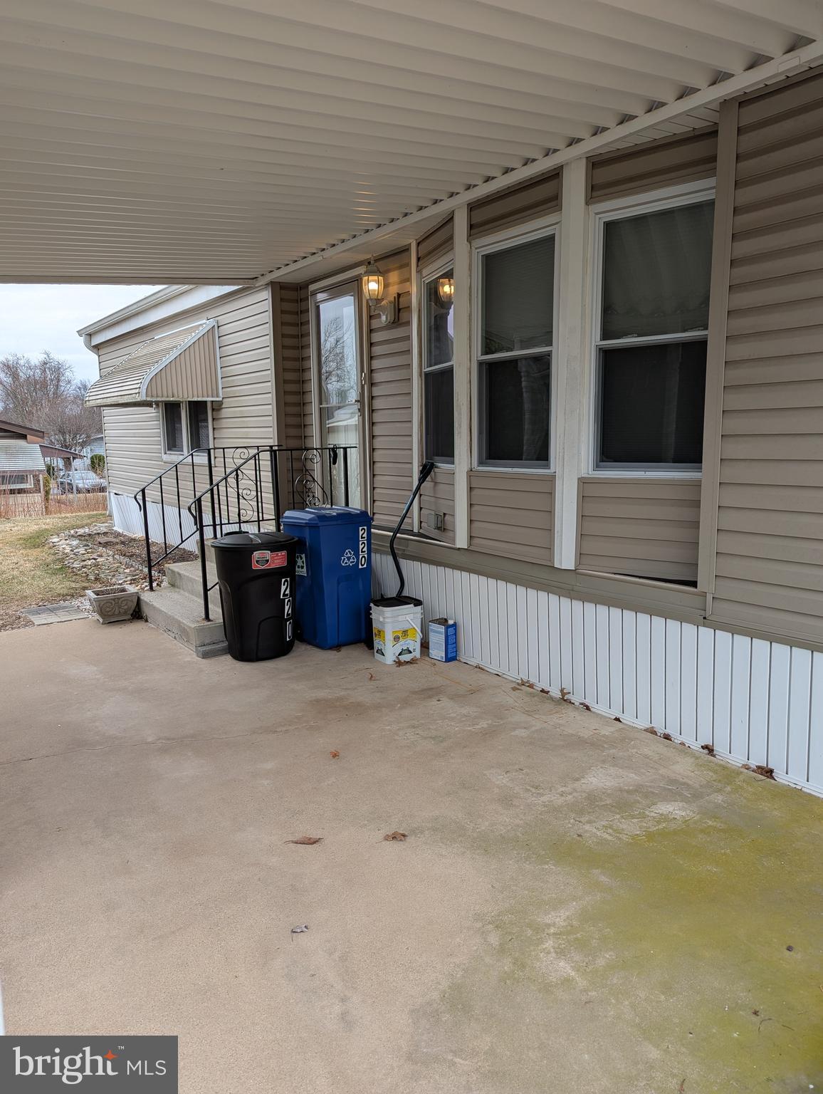220 Winding Brook Run North Wales, PA 19454 - Photo 2 of 38 a view of a house with a patio and wooden fence