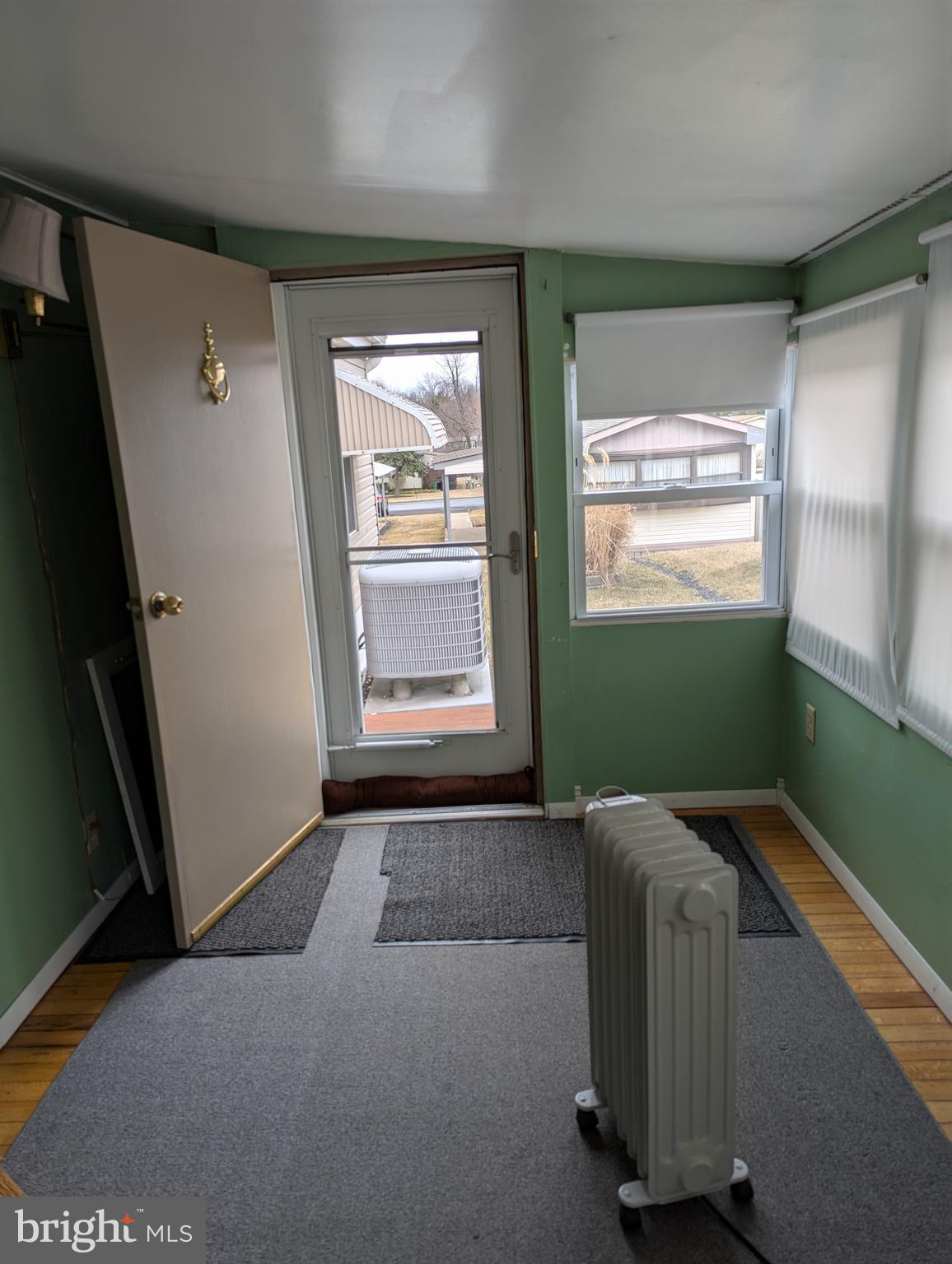 220 Winding Brook Run North Wales, PA 19454 - Photo 32 of 38 a living room with a bed and a window