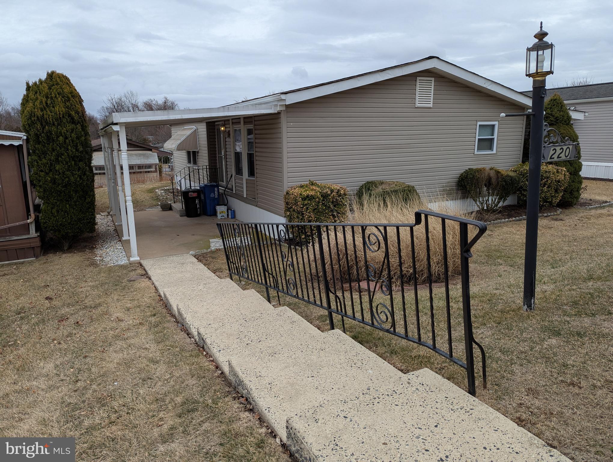 220 Winding Brook Run North Wales, PA 19454 - Photo 38 of 38 a view of a house with backyard and porch