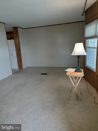 a lamp on a table in a room