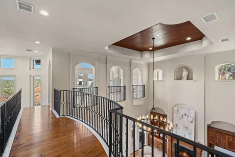 a view of a livingroom with furniture hardwood floor and interior