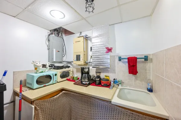 a view of storage and utility room with toys