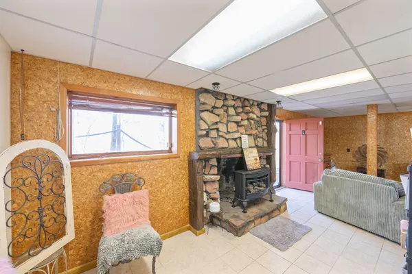 a view of walk in closet with clothes