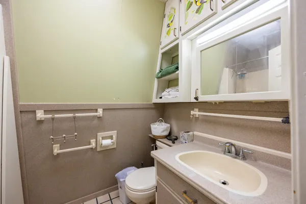 a view of a livingroom with furniture and toys