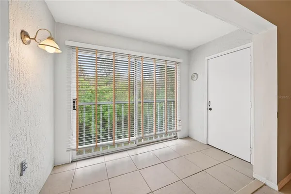 a view of empty room with windows