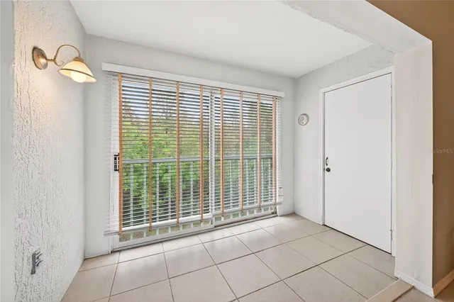 a view of empty room with windows