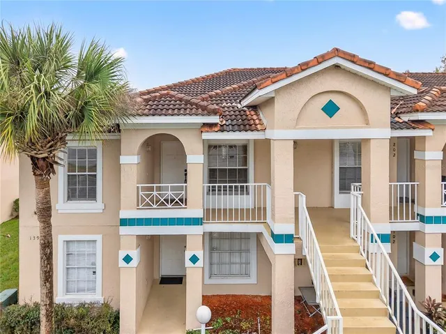 a front view of a house with a garage