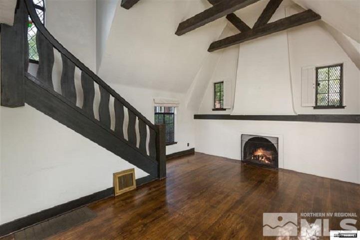 644 Marsh Avenue Reno, NV 89509 - Photo 17 of 19 a view of an entryway with wooden floor and stairs
