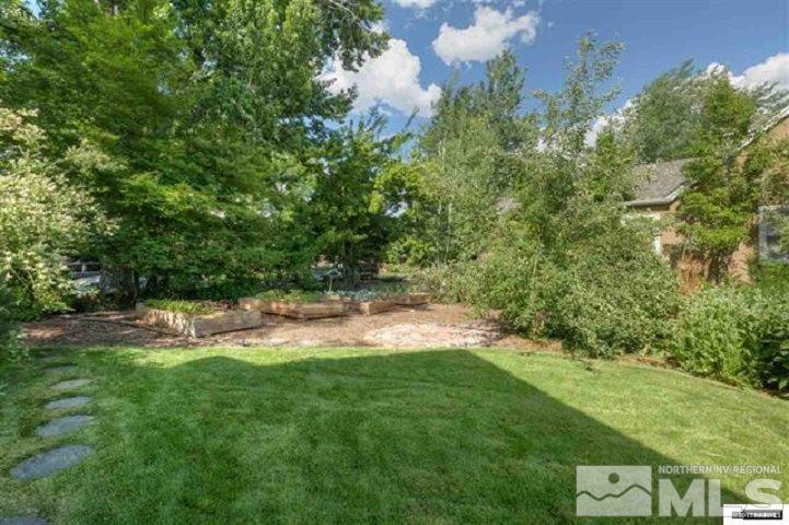 644 Marsh Avenue Reno, NV 89509 - Photo 4 of 19 a view of green field with trees