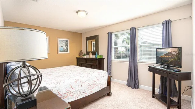 a bathroom with a sink toilet and mirror