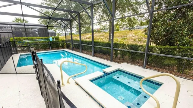 a view of a balcony with floor to ceiling window wooden floor