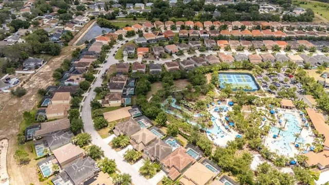 an aerial view of a city with lots of residential buildings