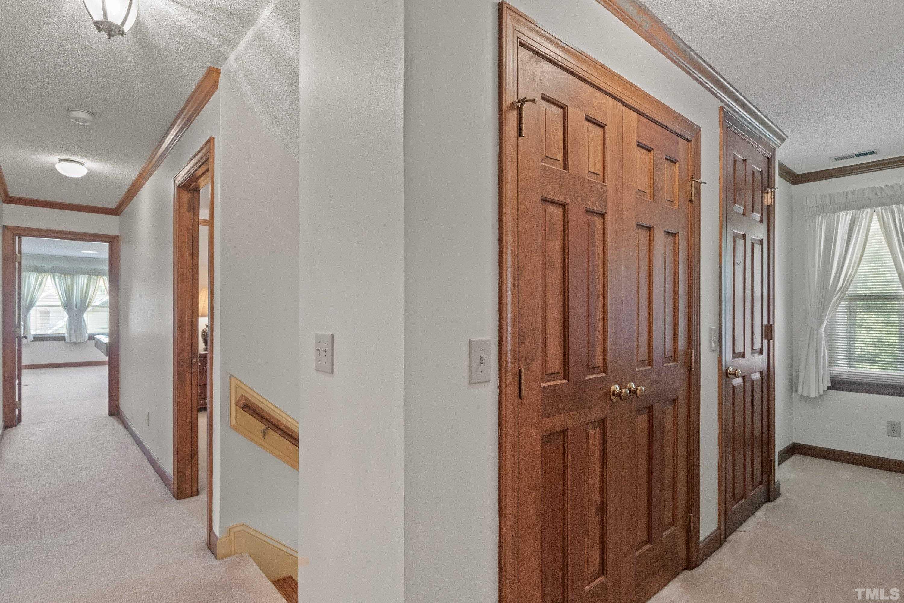 8501 Crowder Road Raleigh, NC 27603 - Photo 49 of 60 a view of a hallway with a elevator
