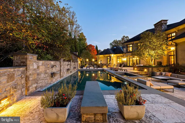 a view of living room filled with furniture and a window