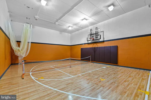 an aerial view of a house with a yard and garden