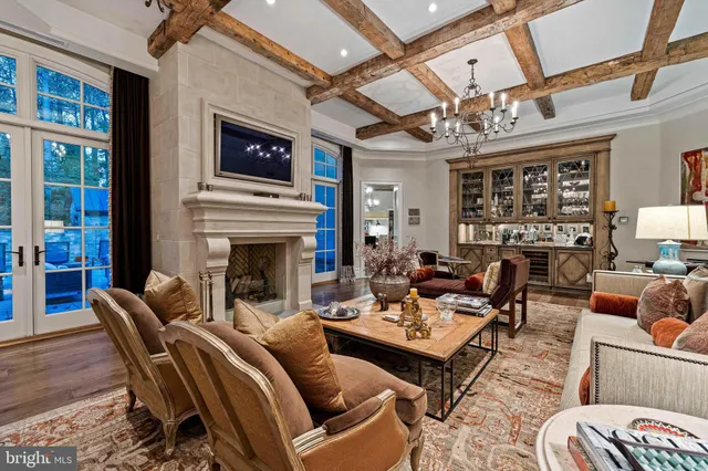 a living room with furniture fireplace and a flat screen tv