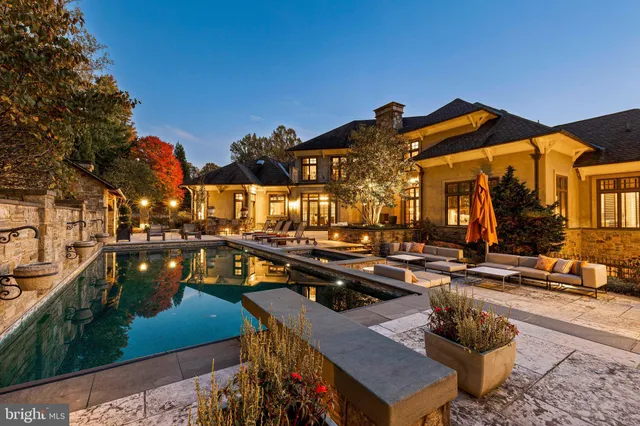 a bed room with furniture and a flat screen tv