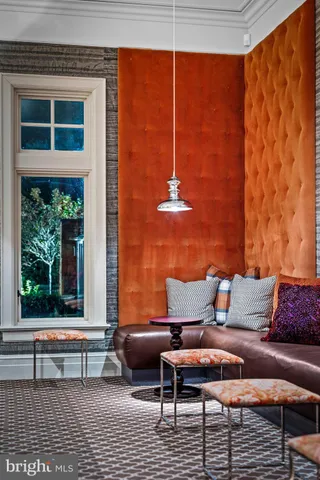 a large kitchen with a table and chairs
