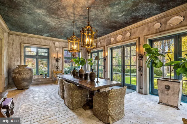 a view of a house with a yard and garden