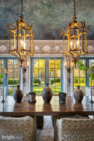 an aerial view of a house with a swimming pool