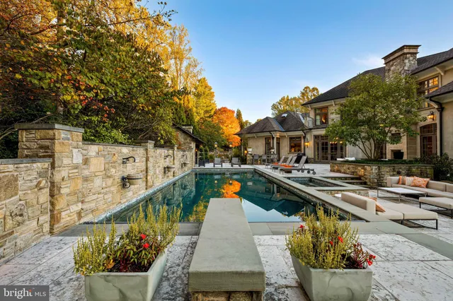 a view of a table and chairs under an umbrella