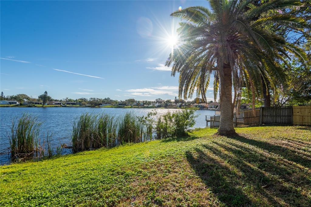 12417 84th Way Largo, FL 33773 - Photo 27 of 27 a swimming pool with outdoor seating and yard
