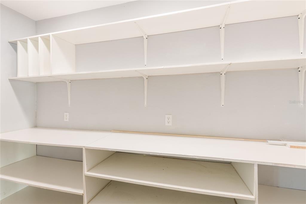 12417 84th Way Largo, FL 33773 - Photo 10 of 27 a view of white cabinets