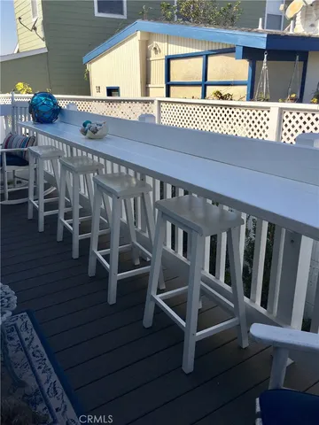 a view of balcony with furniture