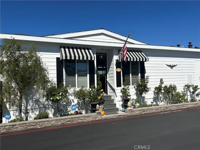front view of a house with a small yard