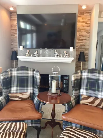 a outdoor living space with patio furniture and potted plants