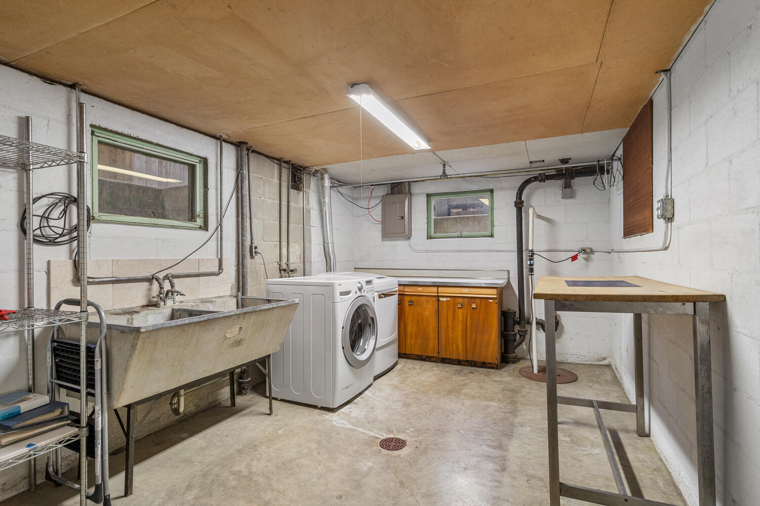 1111 West John Street Champaign, IL 61821 - Photo 30 of 39 a kitchen with a sink and a stove top oven