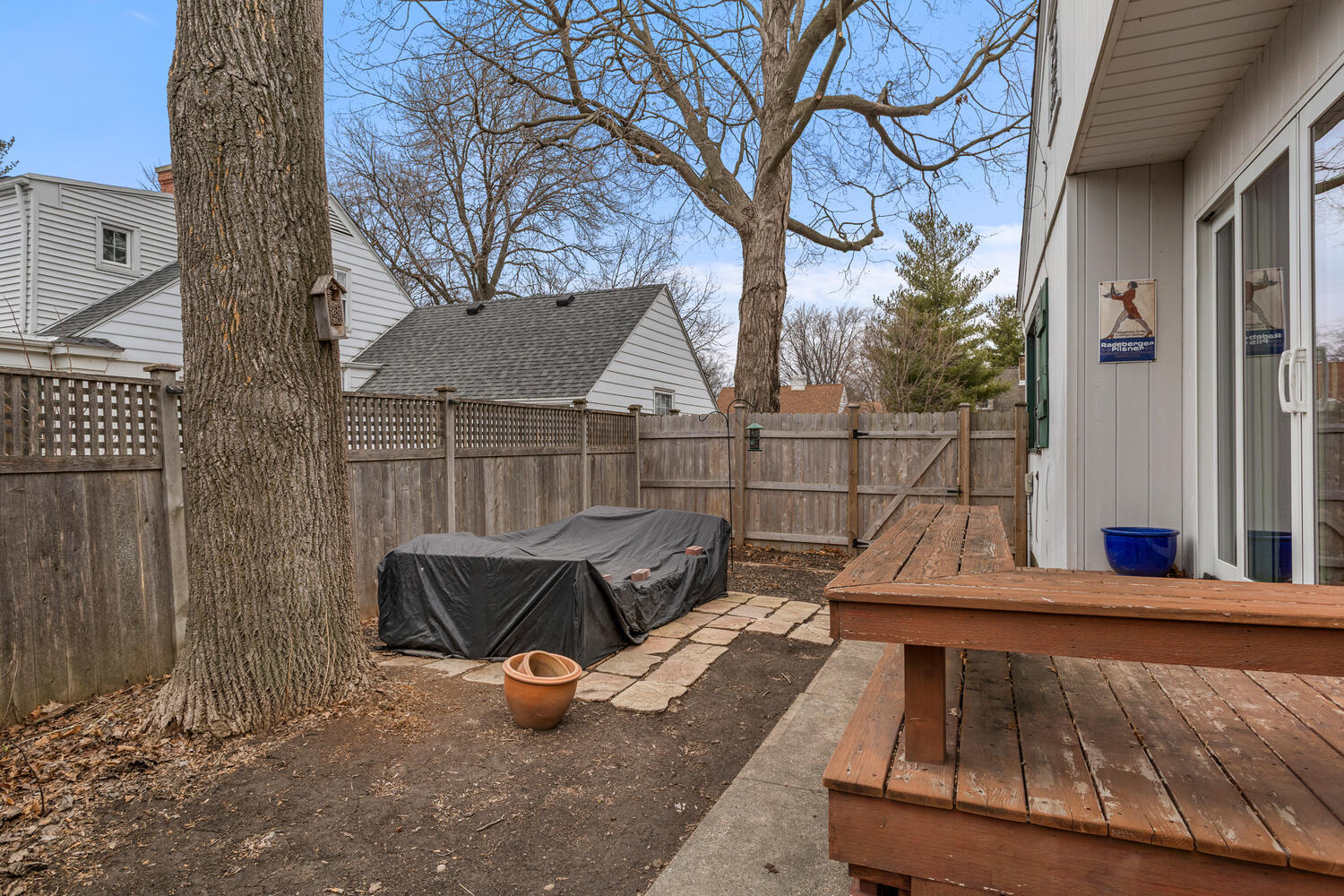 1111 West John Street Champaign, IL 61821 - Photo 32 of 39 a view of sitting area with furniture and wooden fence