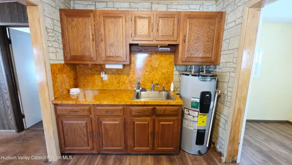 a bathroom with a sink and a shower